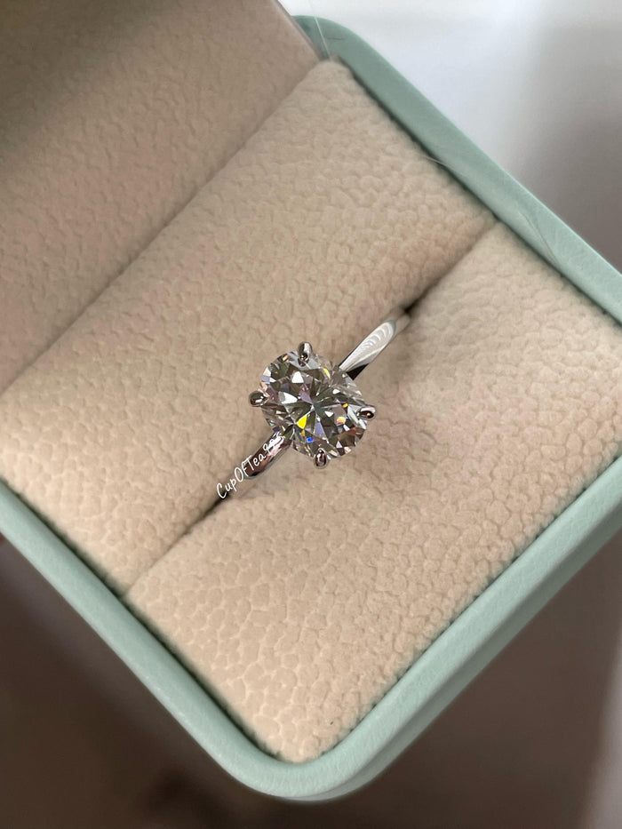2CT moissanite engagement ring with hidden halo. Sterling Silver 925 Engagement Ring with 2CT(7mm*9mm) oval cut the finest D VVS moissanite