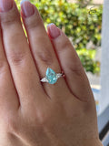 3 carat pear shaped engagement ring with blue crushed ice aquamarine simulated diamond in sterling silver or yellow gold vermeil
