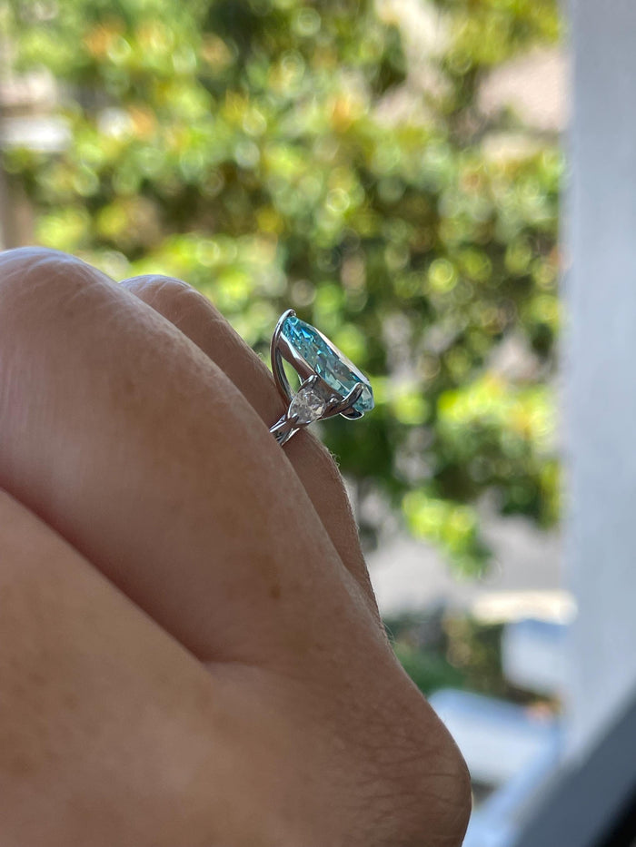 3 carat pear shaped engagement ring with blue crushed ice aquamarine simulated diamond in sterling silver or yellow gold vermeil