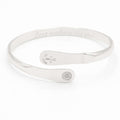 Silver anchor engraved cuff bracelet with oval charm plate and round seal