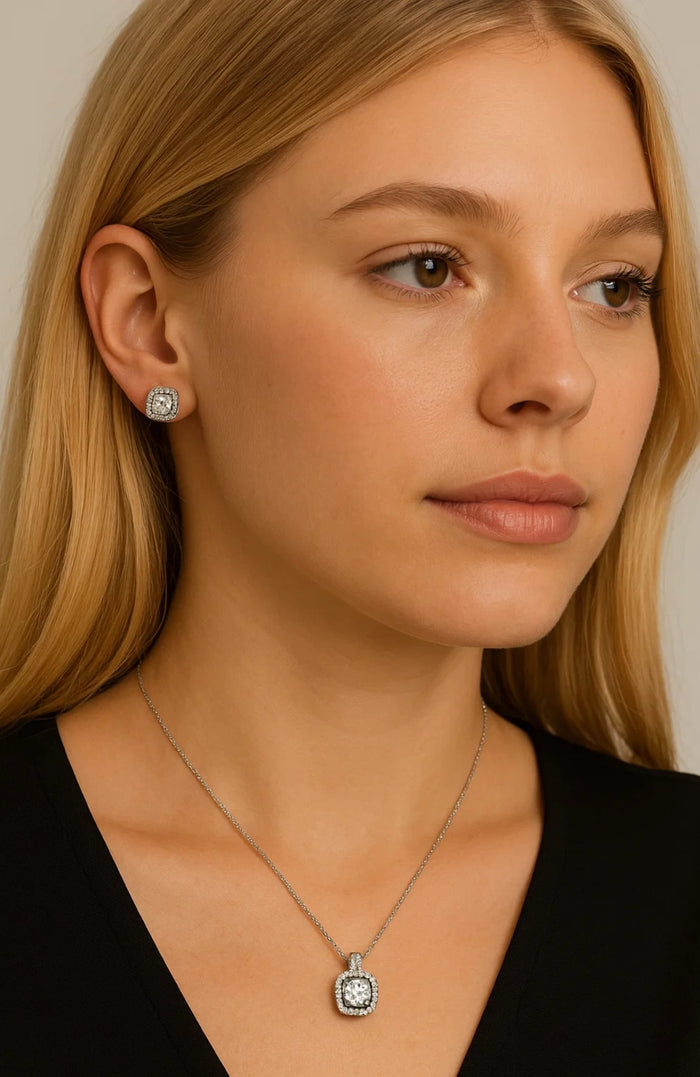 Silver halo stud earrings with square crystal center on model