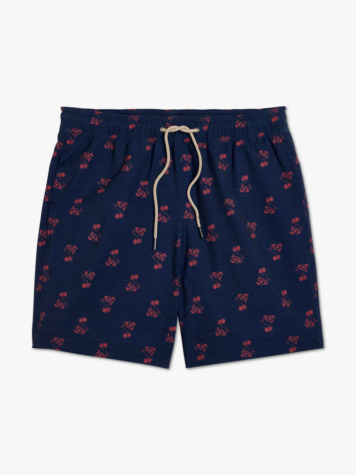 Navy shorts with red pattern on a white background