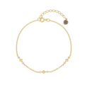 Gold-tone chain link bracelet with geometric zirconia stations and clasp