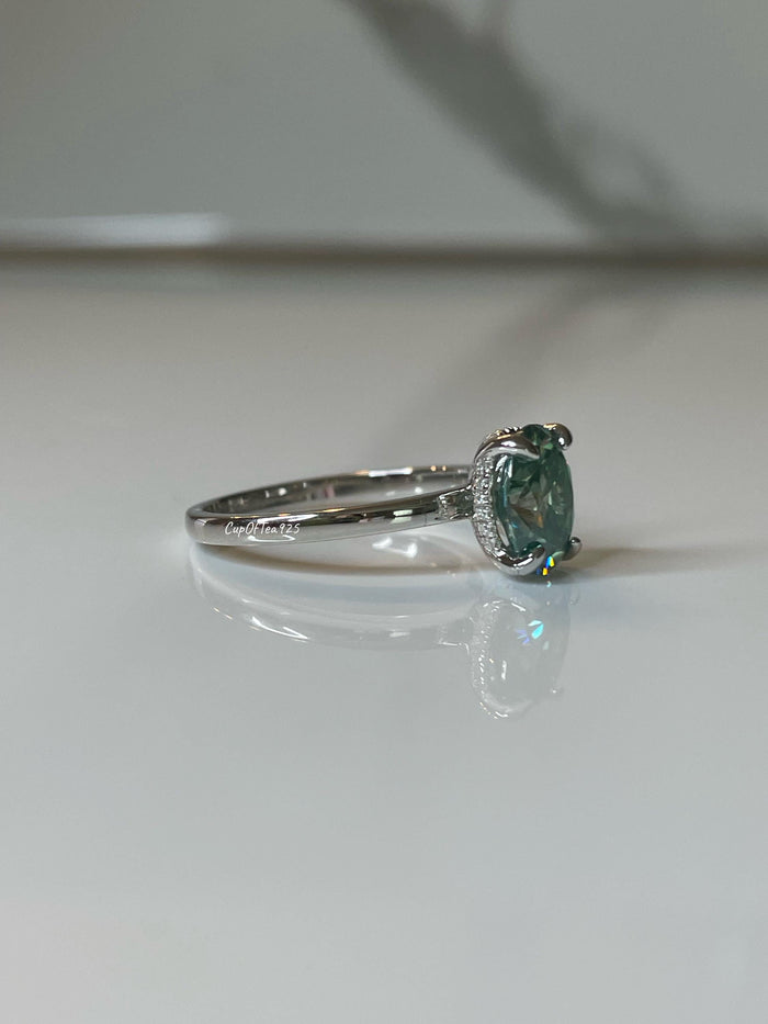 Blue-Green Moissanite Engagement Ring: Sterling Silver Hidden Halo