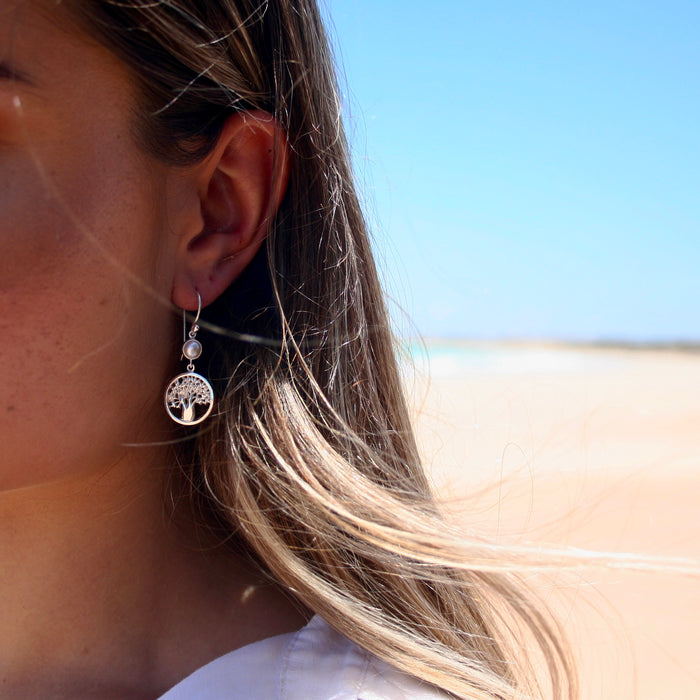 Boab Circle of Life earrings in 925 sterling silver with bezel set freshwater pearl designed in Broome Western Australia