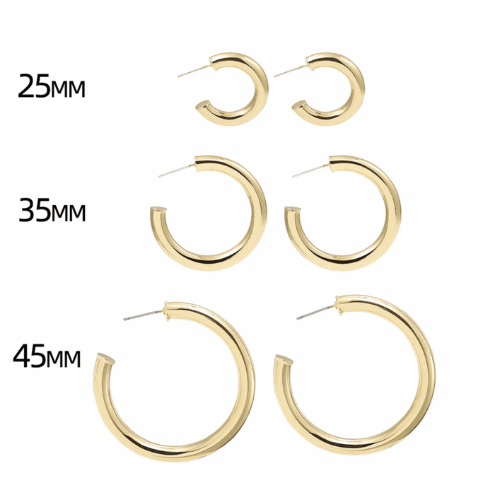 Gold-tone hoop earring set showing three round sizes, thick hoops with pin clasp.