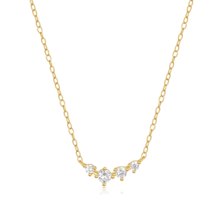 Gold-tone chain necklace with small gemstone cluster at center