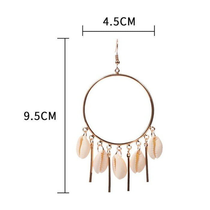 Gold hoop chandelier earrings with peach puka seashell drops and fringe tassels
