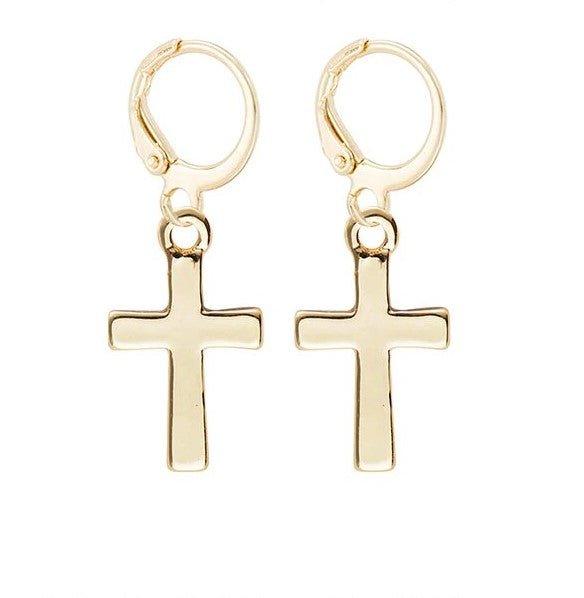 Gold cross dangle hoop earrings with small cross charms on circular hinged loops