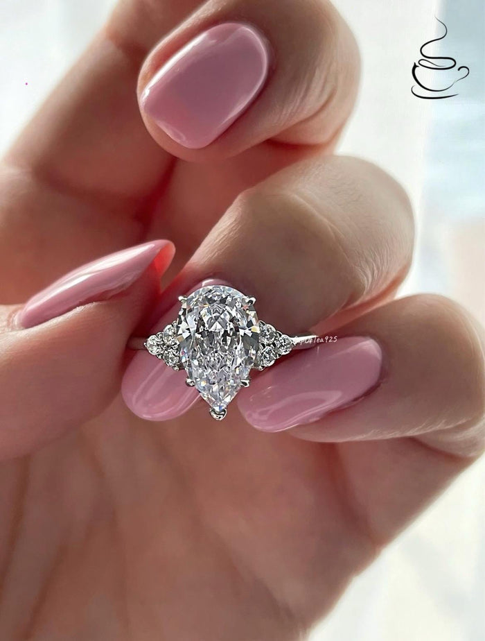 Crushed Ice Pear Cut Engagement Ring: 3CT Simulated Diamond, Sterling Silver
