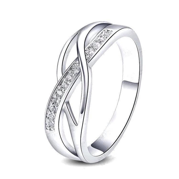 Crystal braided ring with silver-tone band and pavé stones