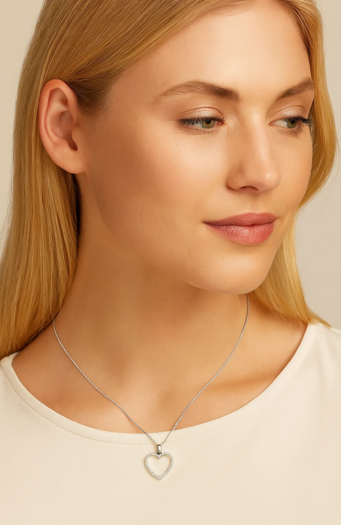Heart pendant necklace with cubic zirconia, silver-tone chain at neckline
