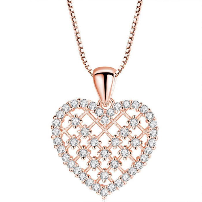 Crystal heart pendant necklace with pavé crystals and rose gold chain
