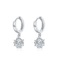 Silver hoop dangle earrings with cubic zirconia snowflake charm