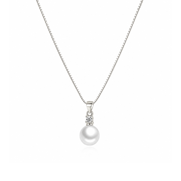 Silver-tone pendant necklace with faux pearl and cubic zirconia charm on chain