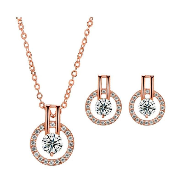 Rose gold cubic zirconia necklace with round halo pendant and matching stud earrings