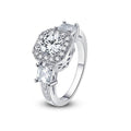 Cubic zirconia halo ring with large round center stone on slim silver band