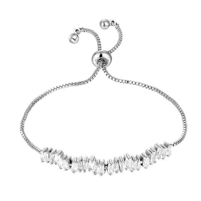 Silver cubic zirconia tennis bracelet with clear stone row and round clasp loops