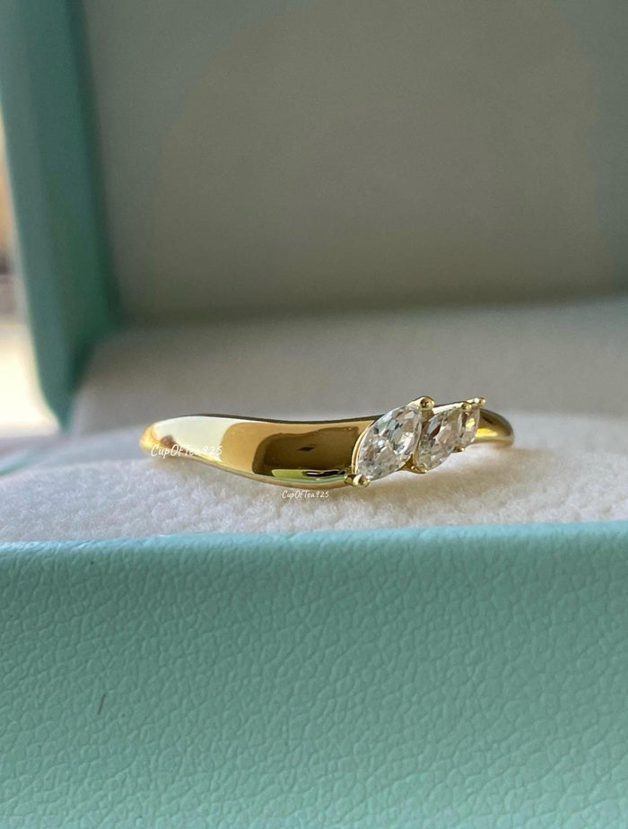 Curved wedding band. Yellow gold, rose gold over silver 925 curved stacking band with marquise cut CZ diamonds