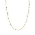 Gold link necklace with small black bead accents along the chain