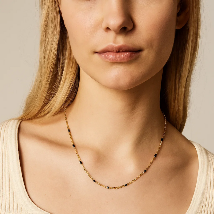 Gold beaded link onyx necklace, fine chain with dark stone bead links.