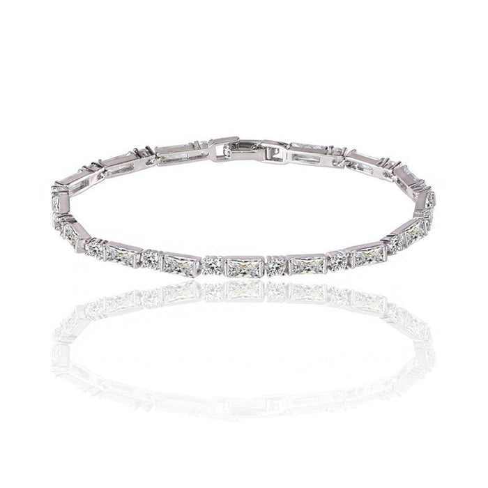 Cubic zirconia tennis bracelet with straight bar settings and clear stones, silver-tone