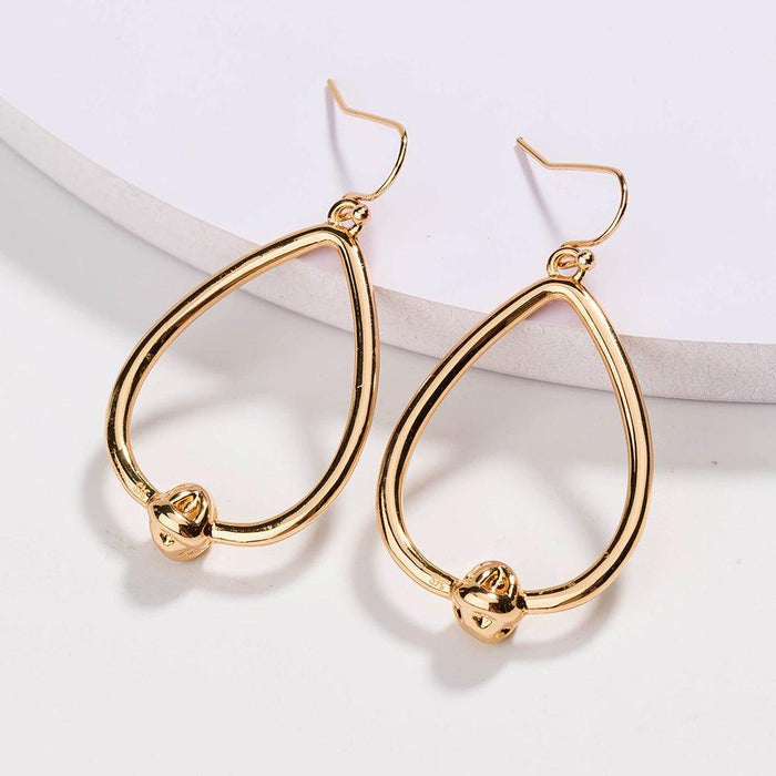 Gold teardrop hoop earrings with love-knot charm and hook backs