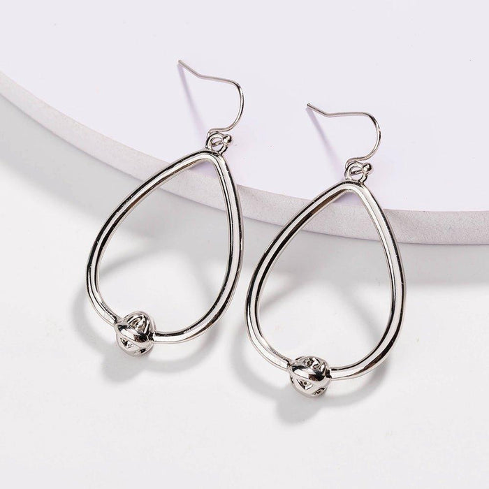 Silver teardrop hoop earrings with love-knot charm and hook backs
