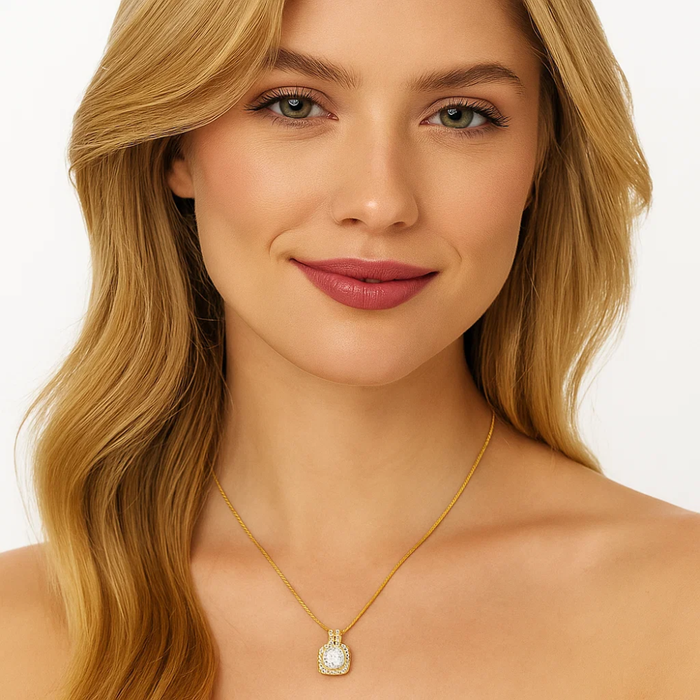 Gold halo pendant necklace with small square setting and round center stone