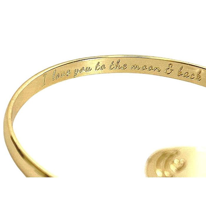Gold engraved bracelet band with moon-heart motif and message text detail