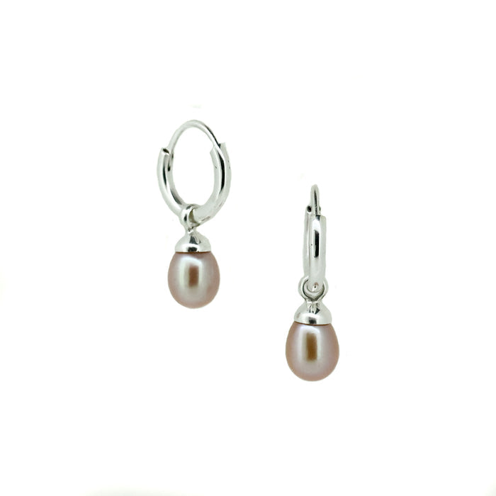 Eternal Summer Sunset Pearl Sleepers Silver crafted in premium 925 sterling silver featuring genuine soft pink freshwater pearl drops suspended from polished sleeper hoops.