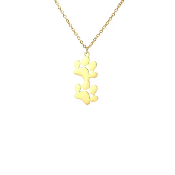 Gold double paw print pendant necklace with linked chain, small charm at center.