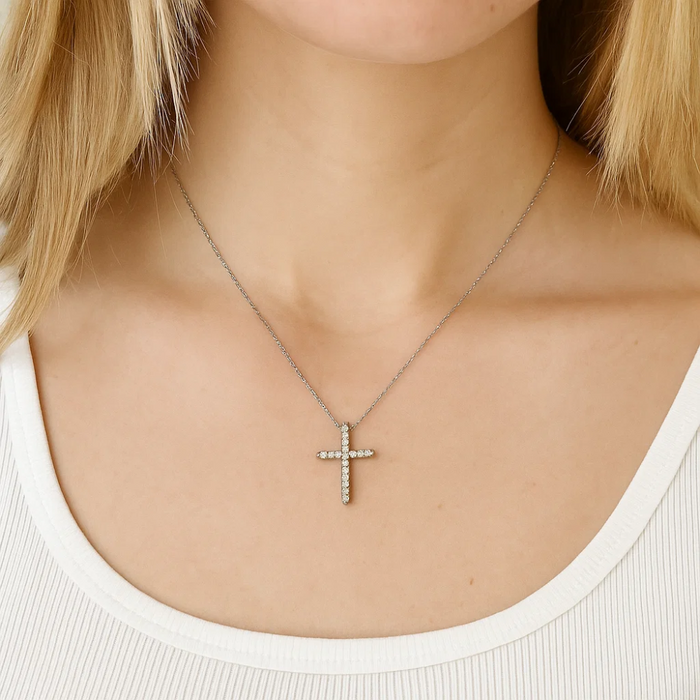 Silver-tone cubic zirconia cross pendant on a fine chain
