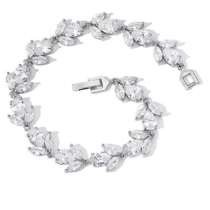 Silver-tone cubic zirconia tennis bracelet with marquise stones and oval accents, box clasp