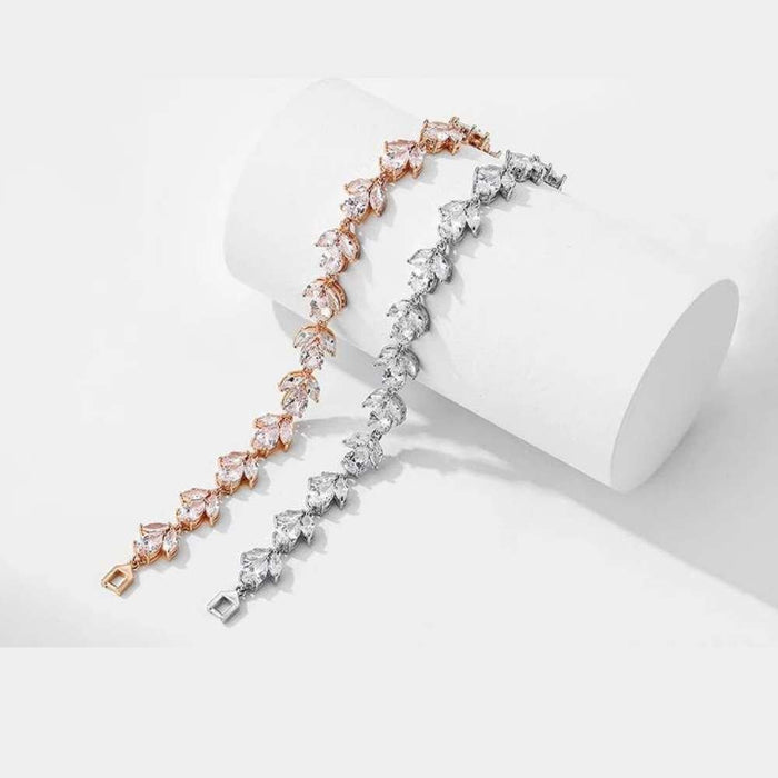 Two-tone tennis bracelet with rose-gold and silver cubic zirconia marquise stones, clasp