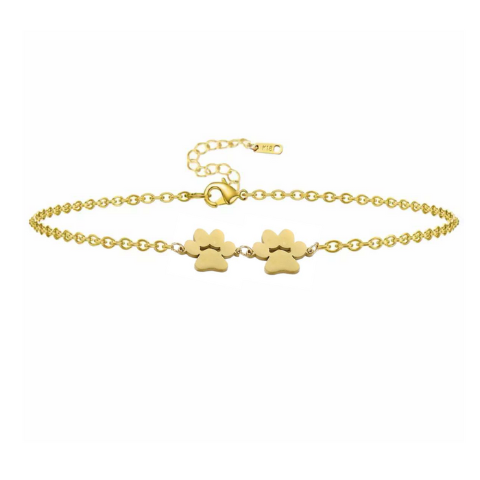 Gold double paw print charm bracelet with lobster clasp
