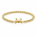 Gold beaded bracelet with crab charm, linked bead chain and lobster clasp