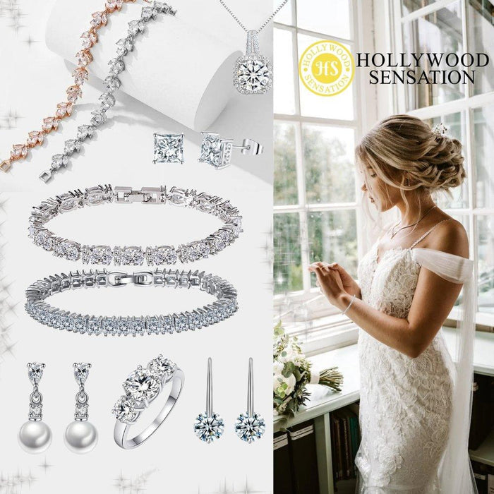Silver-tone marquise cubic zirconia tennis bracelet with hinged clasp
