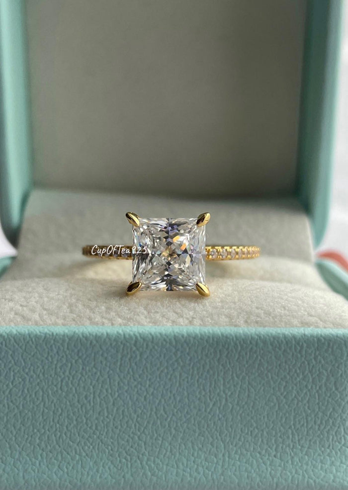 Hidden Halo ring. 18K yellow gold over Sterling Silver 925 engagement ring with 3CT princess cut simulated diamond and hidden halo.
