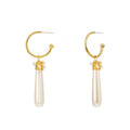 Gold hoop dangle earrings with pearly teardrop pearl charm