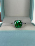 The Joy. Sterling Silver 925 ring with green emerald crushed ice simulated diamond
