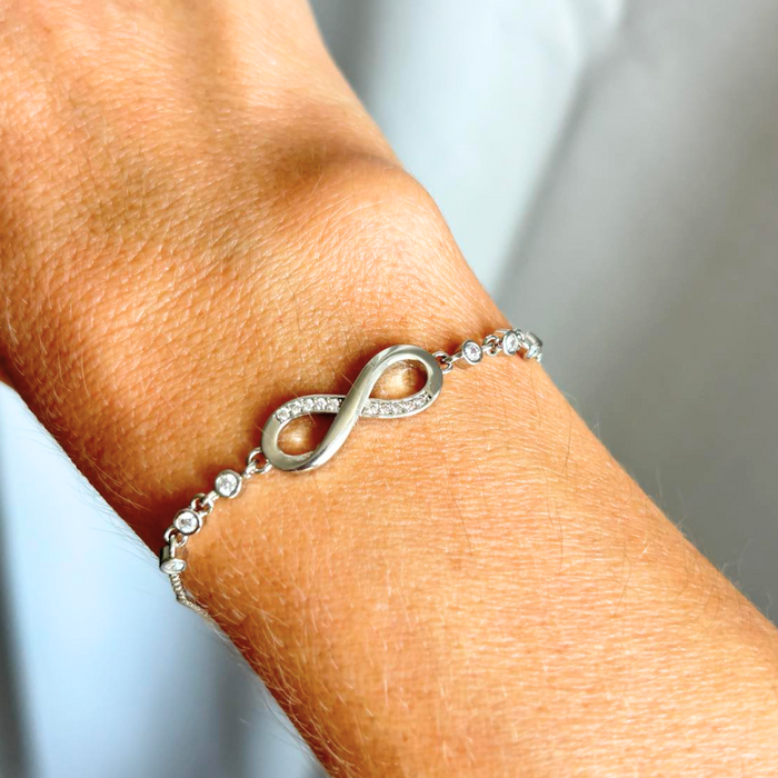 Silver infinity bracelet with small crystal links
