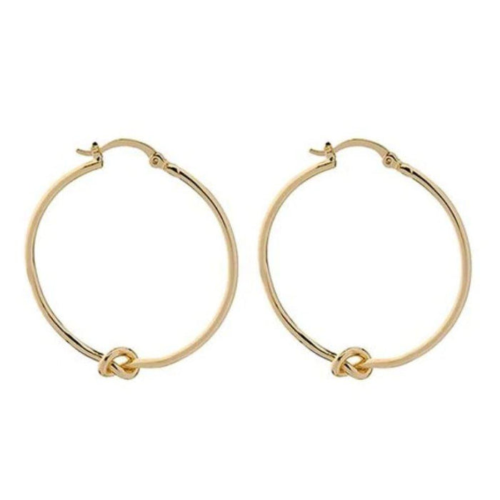 Gold knot hoop earrings with twisted knot detail at front