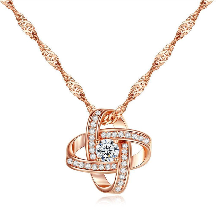 Rose gold knot necklace with cubic zirconia center and ring-link chain