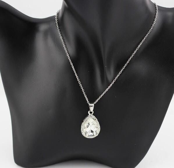 Silver teardrop crystal pendant necklace with large faceted drop on thin chain