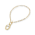 Gold link necklace with large oval pendant and white simulated pearl