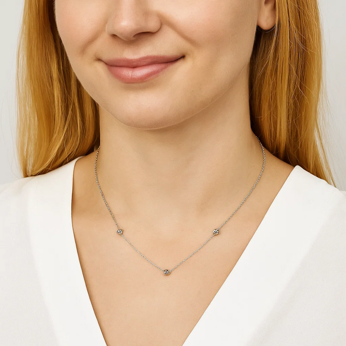 Silver-tone delicate chain necklace with small love-knot charm