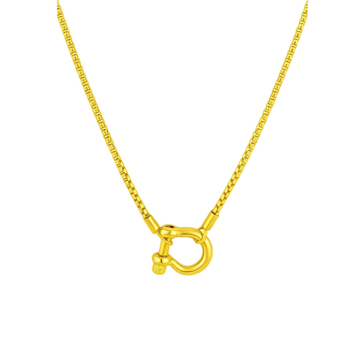 Gold carabiner pendant necklace with horseshoe lock charm on a gold chain