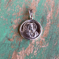 Madonna of the Streets Sterling Silver Round Pendant