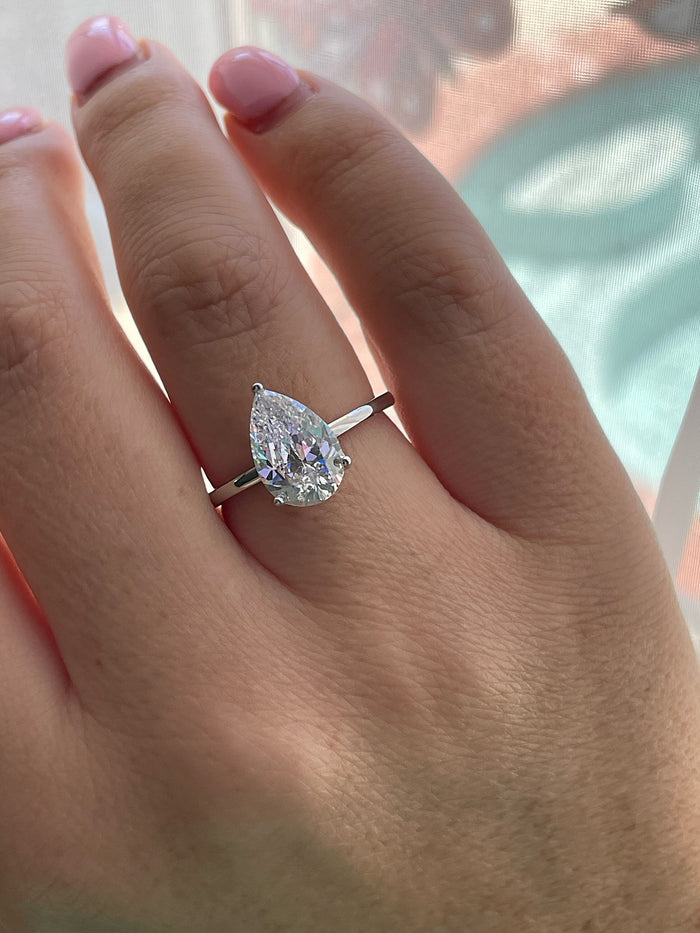Moissanite Sterling Silver 925 bridal set with 2CT, 4CT pear cut solitaire engagement ring and half eternity band
